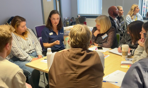 Rosie talking to members